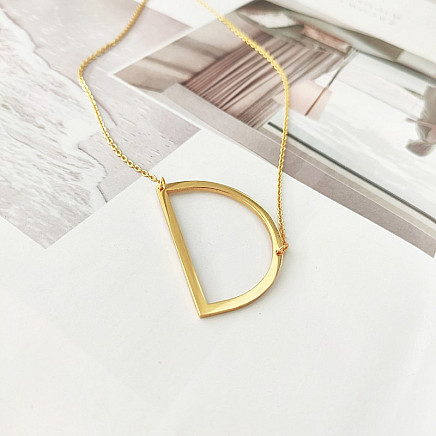 Necklace made of surgical steel, letter D, gold-plated NST995D