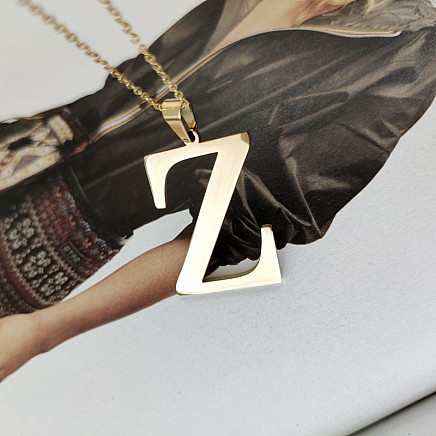 Necklace made of surgical steel, gold-plated letter NST100Z