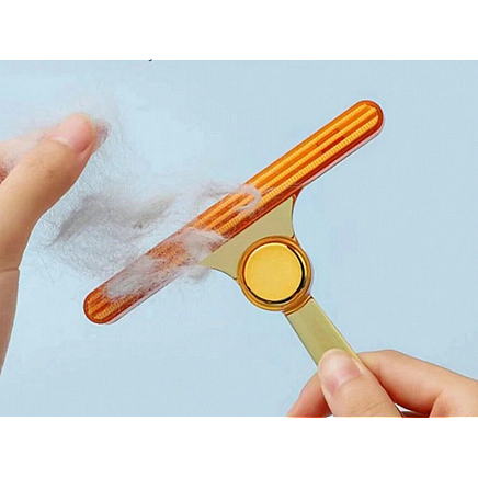 Brush roller for cleaning dog hair from rugs and carpets double sided