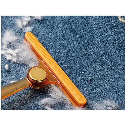 Brush roller for cleaning dog hair from rugs and carpets double sided