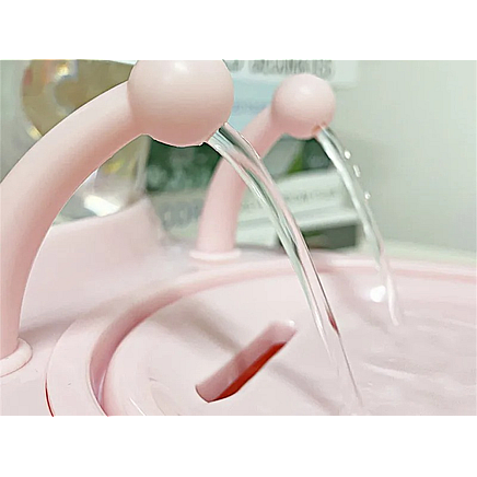 Automātiskā dzirdinātava kaķiem un suņiem gliemeža formā ar filtru