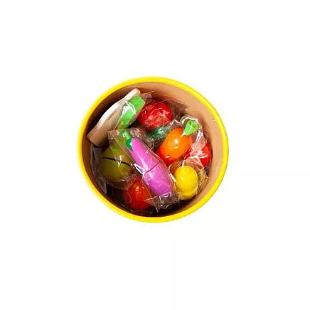 Wooden chopping vegetables in a bucket