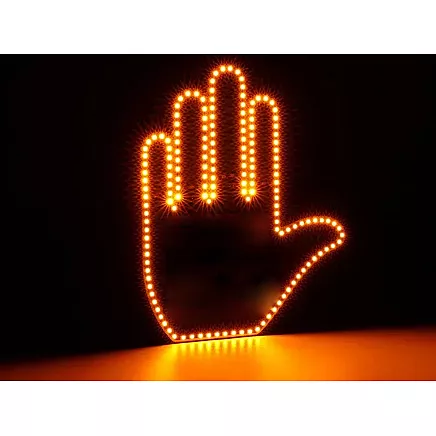 Gesture signalling hand on the rear window of a car middle finger led remote control