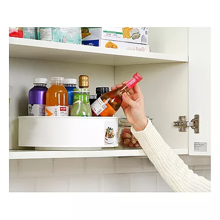 Rotating kitchen organiser spice bowl
