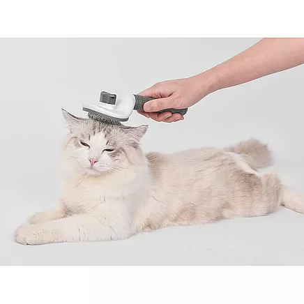 Pašattīroša suka suņiem un kaķiem spalvas izķemmēšanai