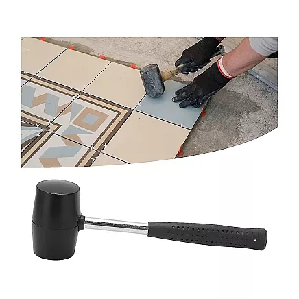 Recoilless rubber paving hammer