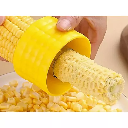 Kukurūzas graudu noņēmējs–mizotājs (plastmasa, 6,8×4,8 cm)