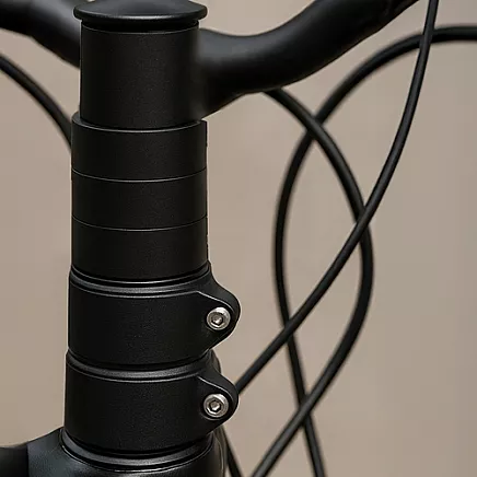 Velosipēda stūres iznesuma pagarinātājs Trizand 25993, 28,6 mm, melns