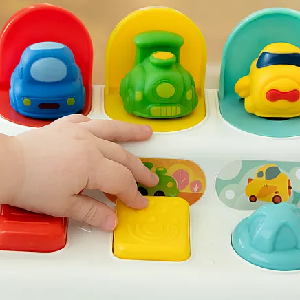 Attīstošā pop-up rotaļlieta ar transportlīdzekļiem KRUZZEL 26379