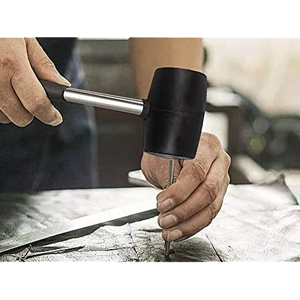 Recoilless rubber paving hammer