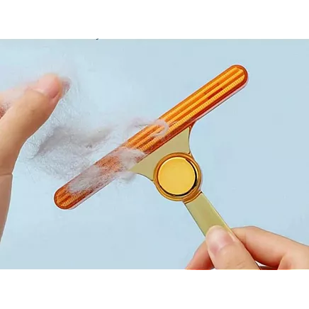 Brush roller for cleaning dog hair from rugs and carpets double sided