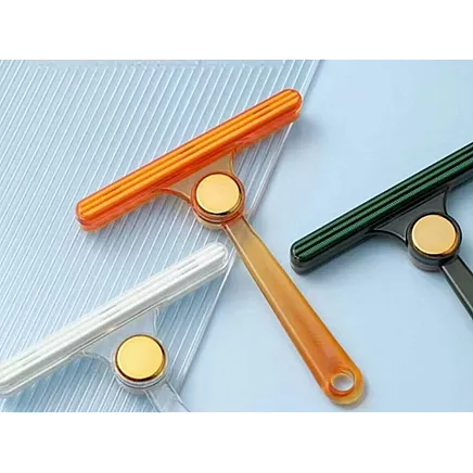 Brush roller for cleaning dog hair from rugs and carpets double sided